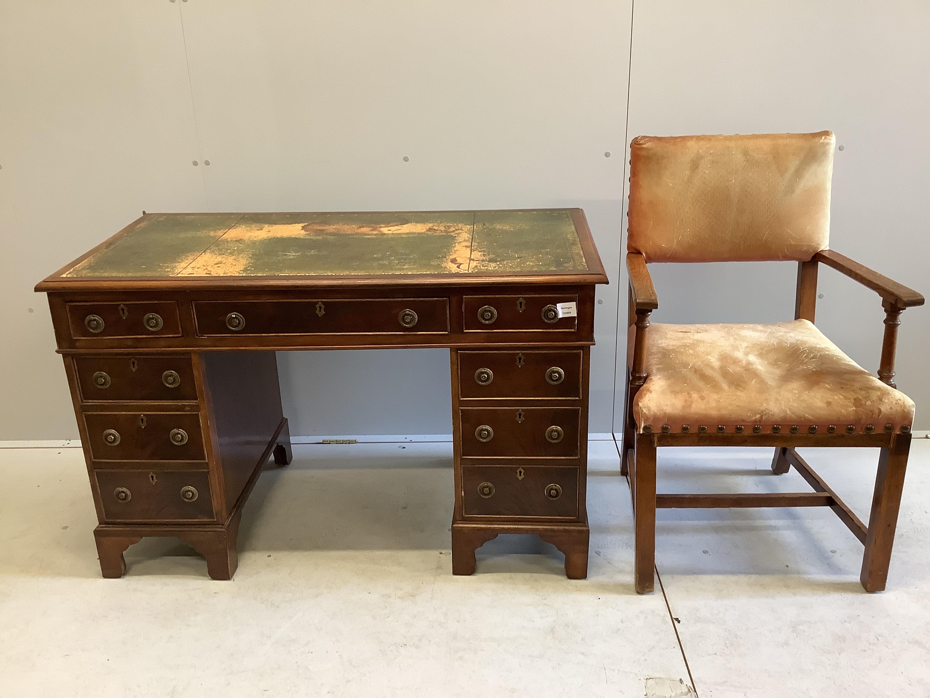 A late Victorian mahogany pedestal desk, width 121cm, depth 61cm, height 77cm together with a later oak elbow chair